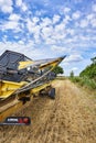 View along a mowing machine standing on a harvested field in the surrounding countryside of Ã¢â¬â¹Ã¢â¬â¹Berlin, Germany Royalty Free Stock Photo